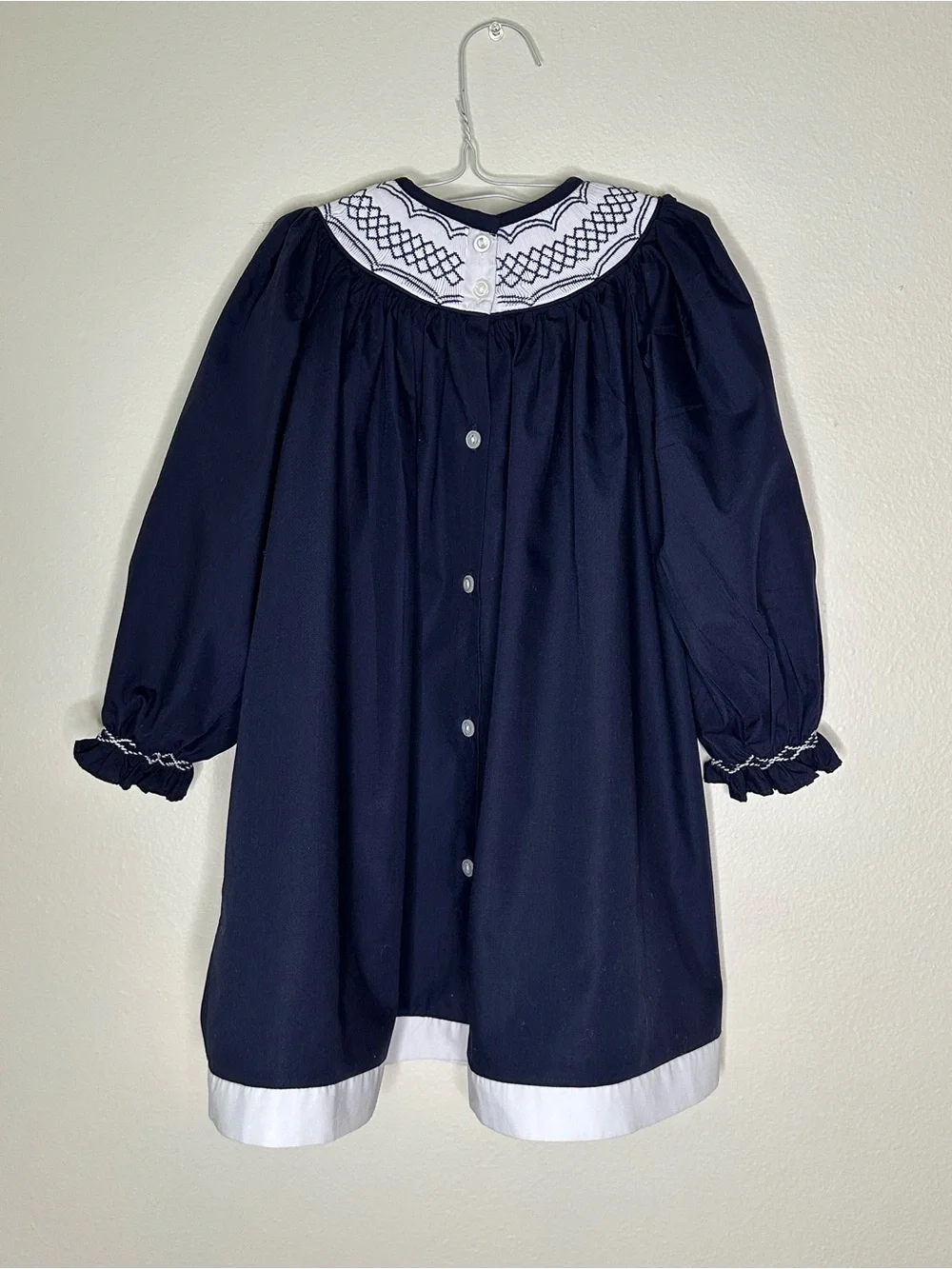 The Beaufort Bonnet Co. 4 T navy and white bishop smocked dress.
